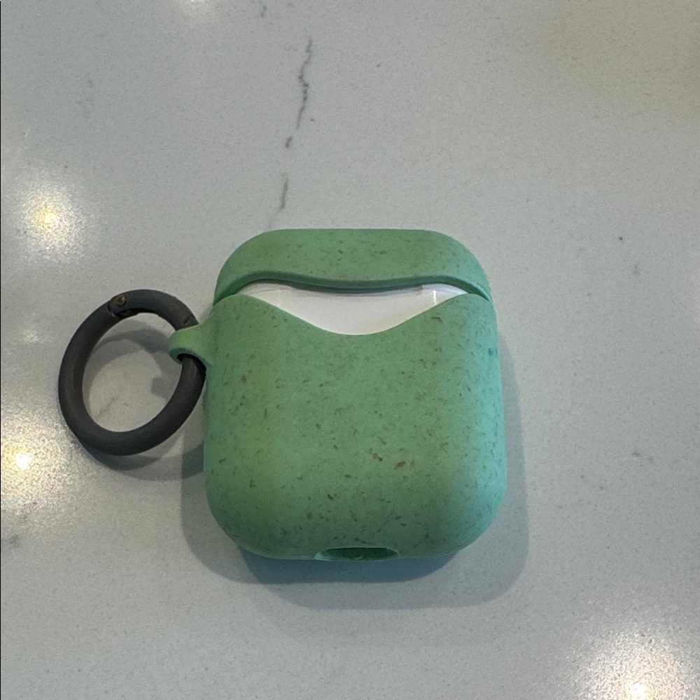 Original AirPods including Pela Case with Keyring